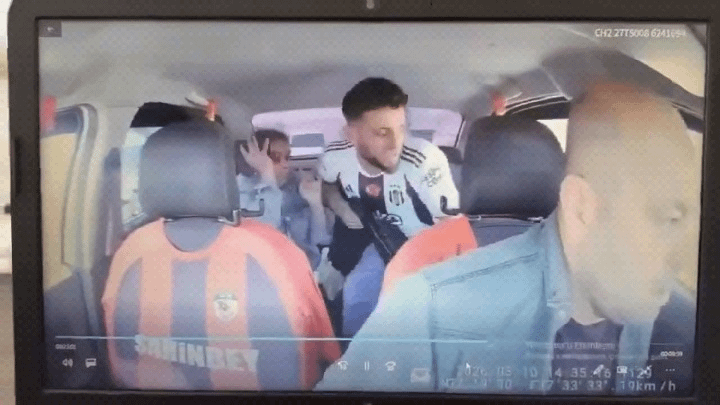 The armed attacker hijacks the taxi. The police are shooting at a taxi with 2 civilians. While the driver is trying to take the gun from the man's hand, he says stop, I'll shoot. What a good police we have (!)