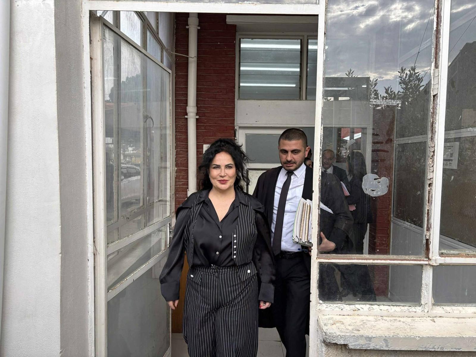 Fatma Unal leaving the courthouse in Morphou [Yeniduzen]