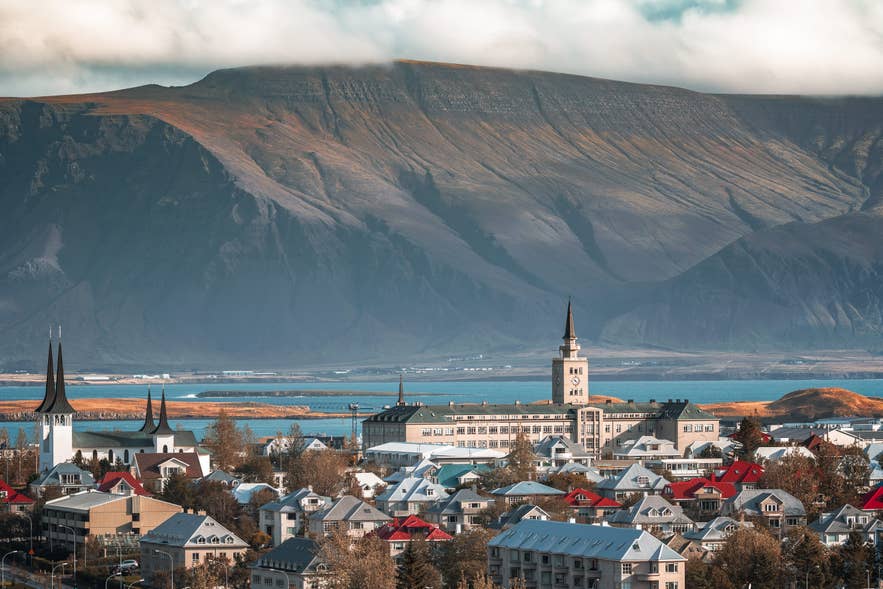 View of Reykjavik with Mt. Esja in the background during Iceland in June. View of Reykjavik with Mt. Esja in the background during Iceland in June.