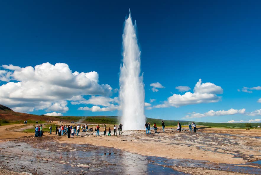 Strokkur Geysir shoots up water into the air. Strokkur Geysir shoots up water into the air.