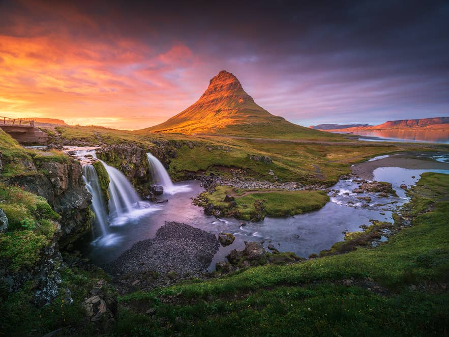Mount Kirkjufell bathed in soft afternoon light. Mount Kirkjufell bathed in soft afternoon light.