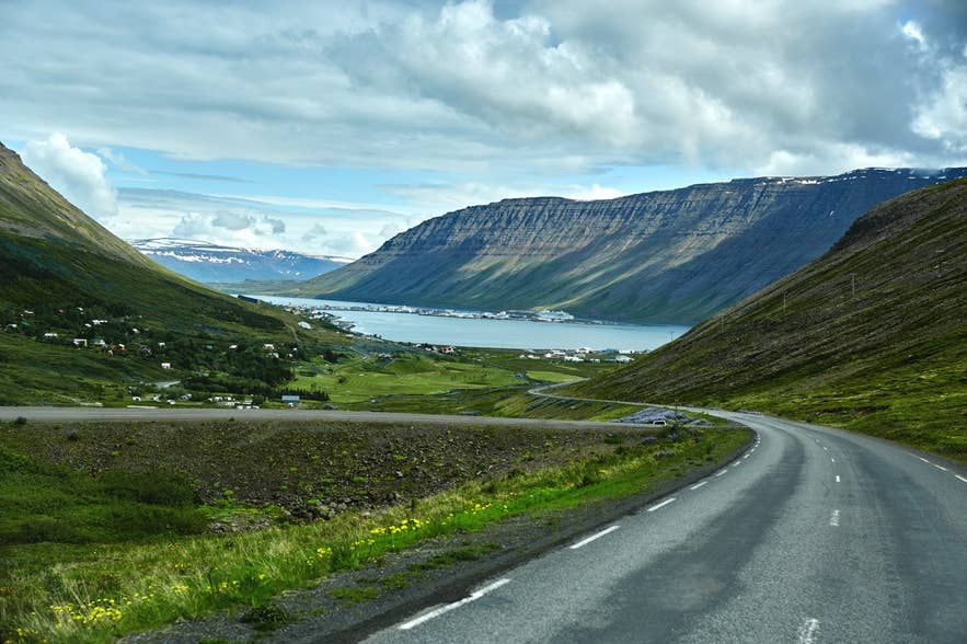 A mountain road to the town of Isafjordur and a view of the fjord A mountain road to the town of Isafjordur and a view of the fjord