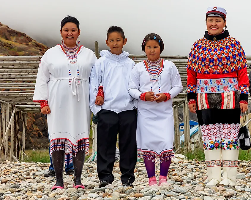 An Inuit family in traditional clothing in Greenland.