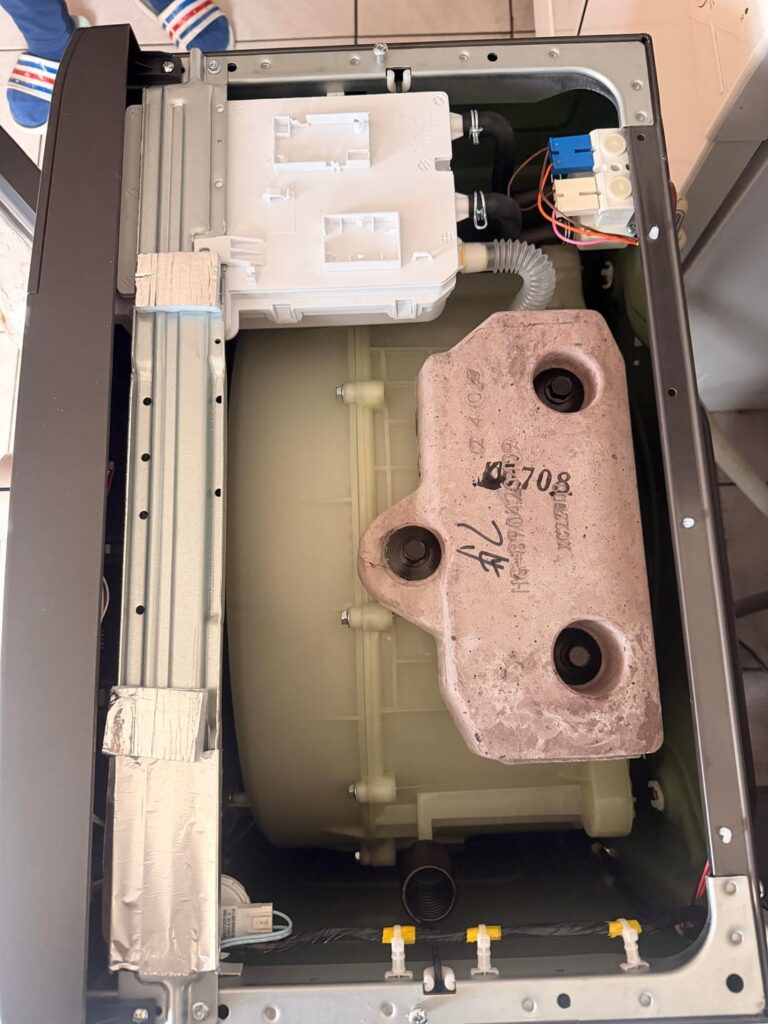 Washing machine top panel doesn’t fit in the kitchen cabinet Washing machine top panel doesn't fit in the kitchen cabinet