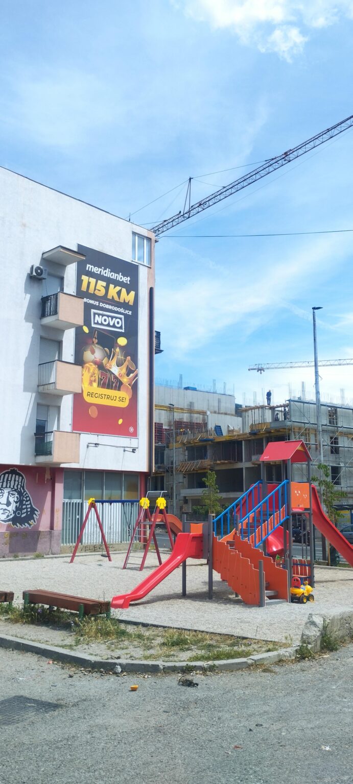 Meridian bet advertising at a children's playground in Mostar