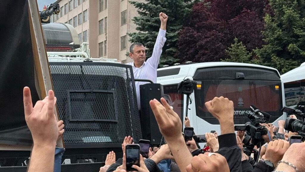 The main opposition leader in Turkey is climbing onto a police armored vehicle, sending a message of resistance.