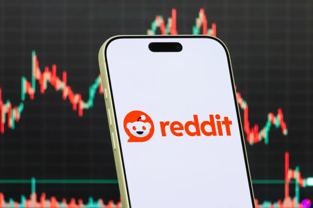 A smartphone displays the logo of Reddit Inc. (Photo illustration by Cheng Xin/Getty Images)