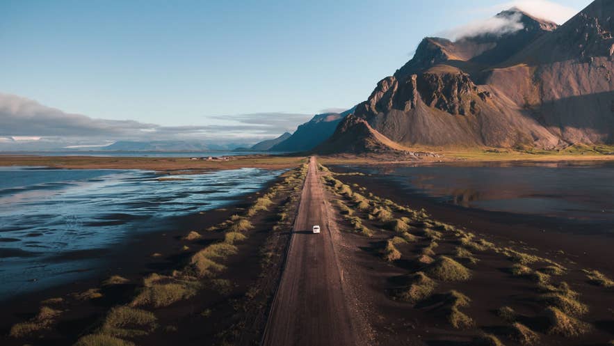 Aerial view of road at Stokksnes with Vestrahorn Mountain in East Iceland. Aerial view of road at Stokksnes with Vestrahorn Mountain in East Iceland.