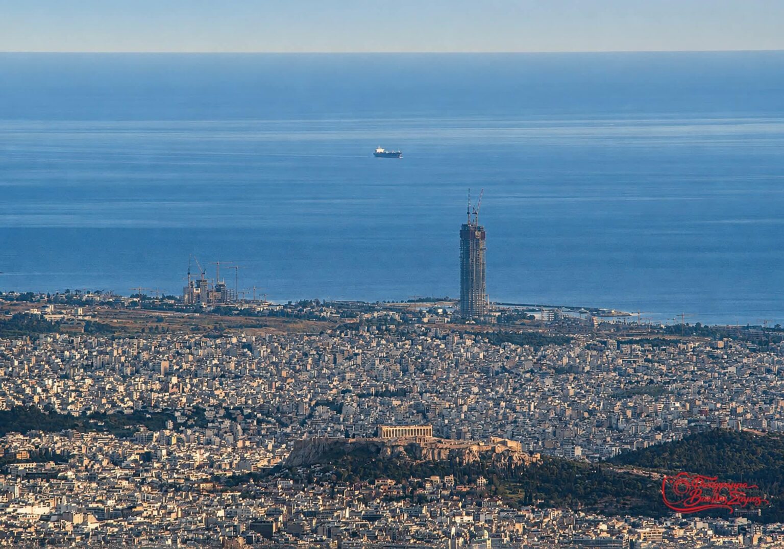 Tower of Latsis group in Elliniko and Acropolis with telephoto lens
