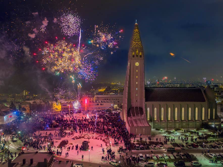Bird's-eye view of New Year's fireworks in front of Hallgrimskirkja, Reykjavik by Arctic-Images/Getty Images Bird's-eye view of New Year's fireworks in front of Hallgrimskirkja, Reykjavik by Arctic-Images/Getty Images