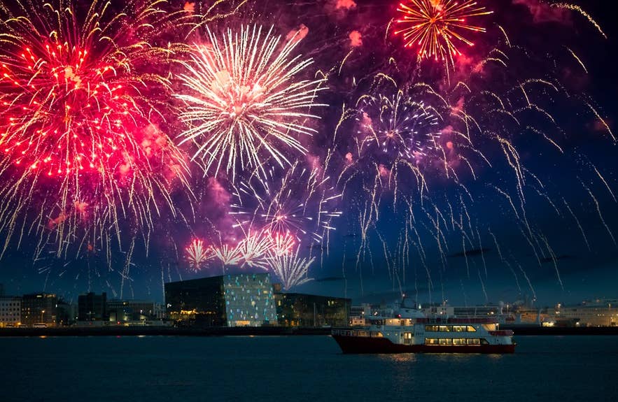 Boat ride in Reykjavik harbor offers stunning views of New Year’s Eve fireworks lighting up the sky Boat ride in Reykjavik harbor offers stunning views of New Year’s Eve fireworks lighting up the sky