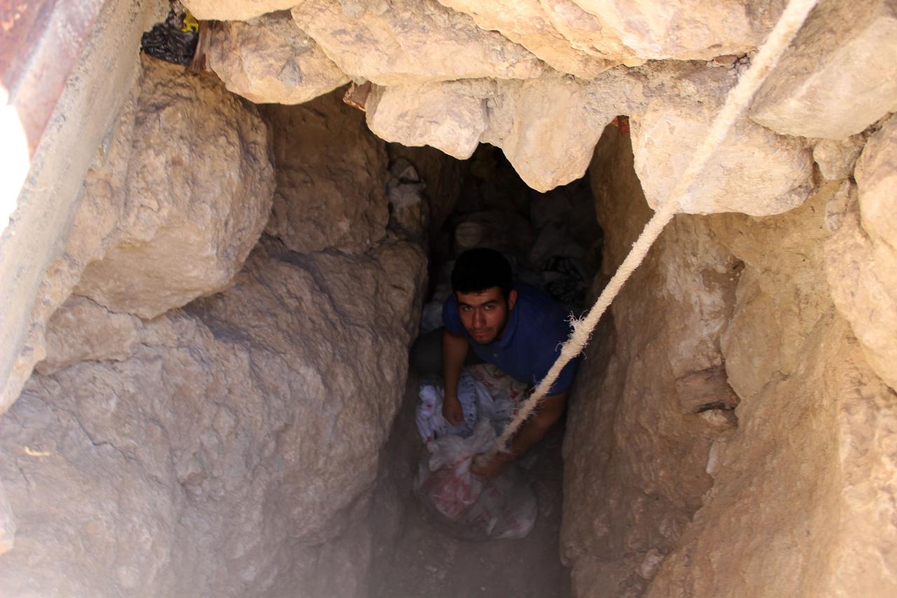 Cheese is stored in sacks inside the caves from May to October and used throughout winter. Erzincan, Türkiye, May 22, 2026. (IHA Photo)