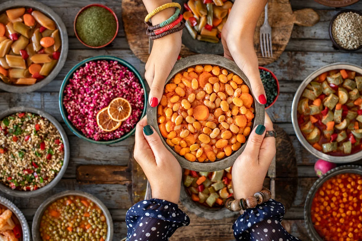 A table of dishes including several based around beans