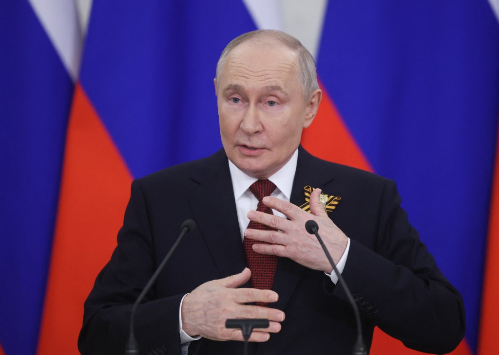 Russian President Vladimir Putin speaking to the media.