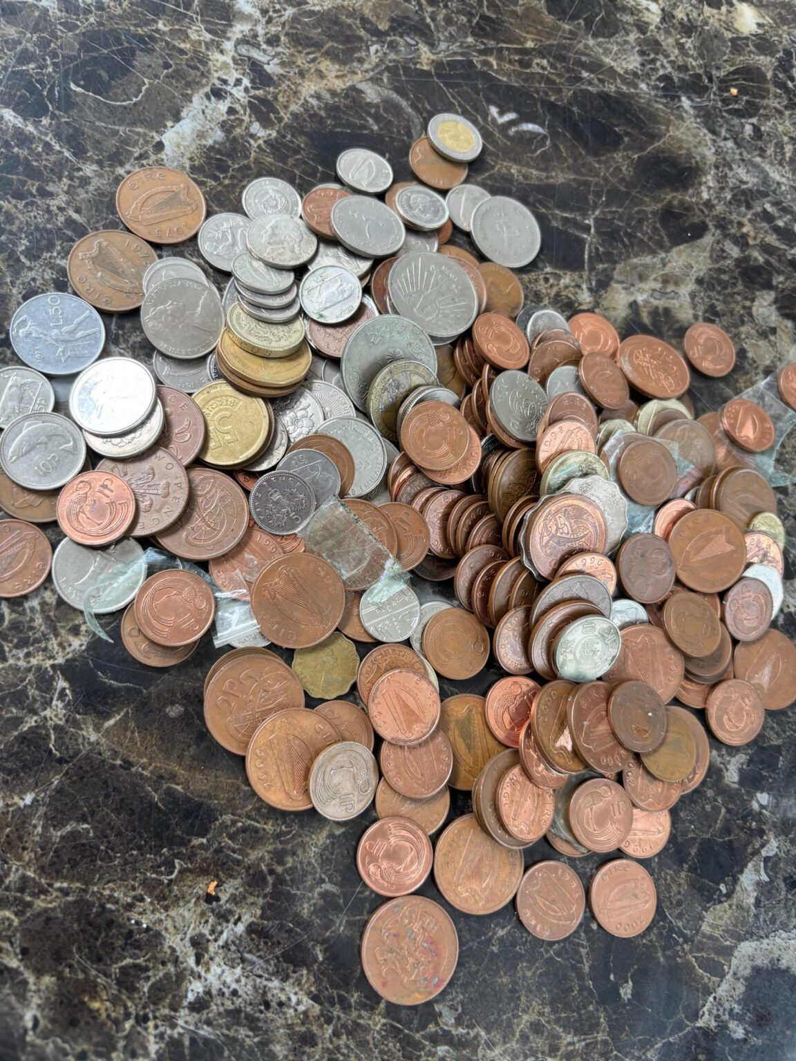 Found a bunch of old coins (mostly Irish £) in the house I just moved into