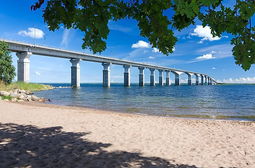 Summer view of the Öland Bridge from a beach along the coast in Sweden