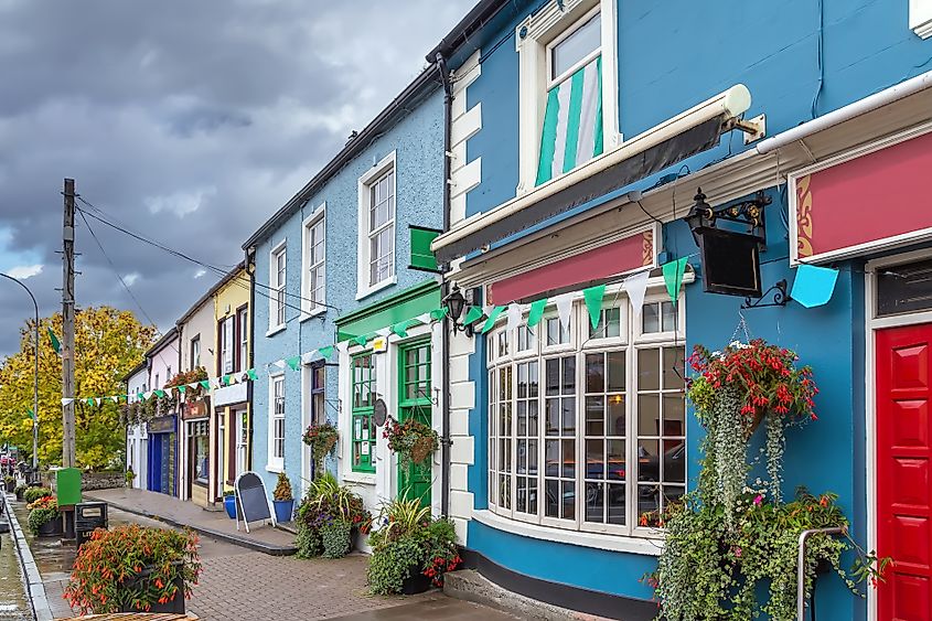 Street with bright houses in Adare, County Limerick, Ireland 