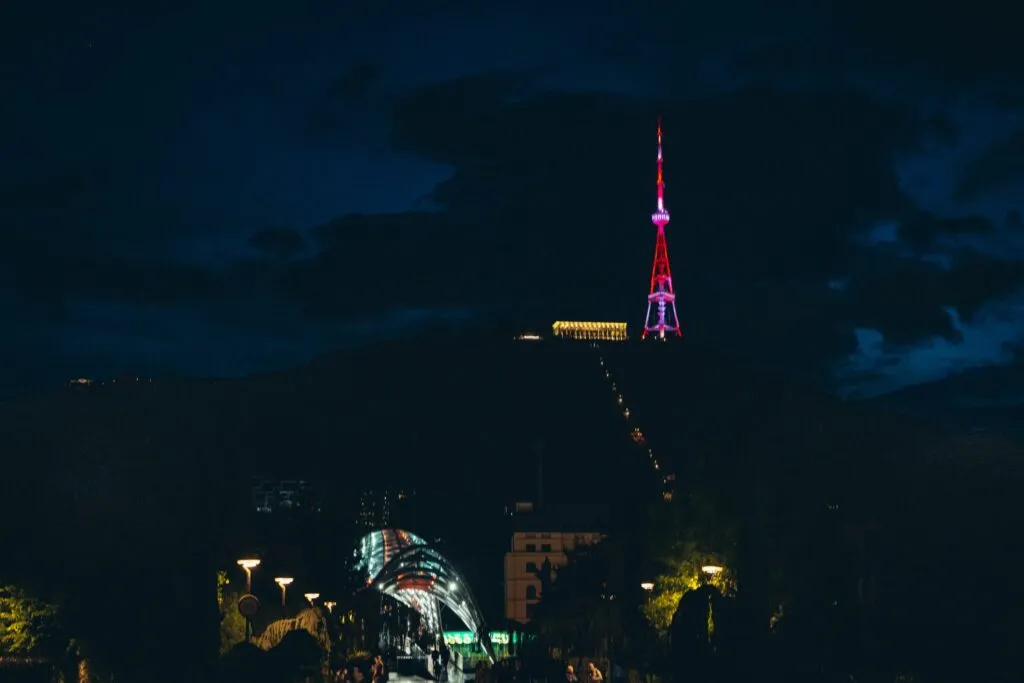 Tbilisi TV Tower and Bridge of Peace illuminated in colors of the Georgian flag Tbilisi TV Tower and Bridge of Peace illuminated in colors of the Georgian flag