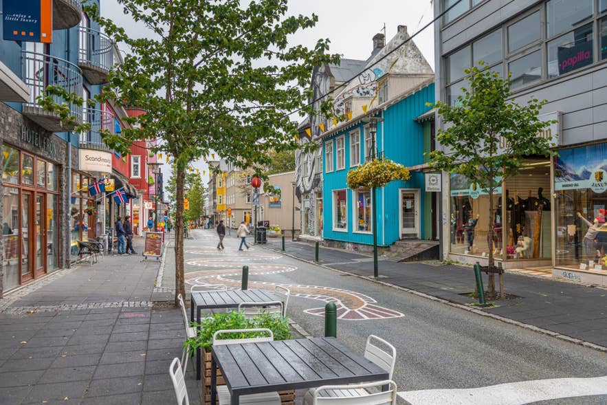 Colorful Reykjavik shopping street with souvenir shops and cafes in downtown IcelandColorful Reykjavik shopping street with souvenir shops and cafes in downtown Iceland Colorful Reykjavik shopping street with souvenir shops and cafes in downtown IcelandColorful Reykjavik shopping street with souvenir shops and cafes in downtown Iceland