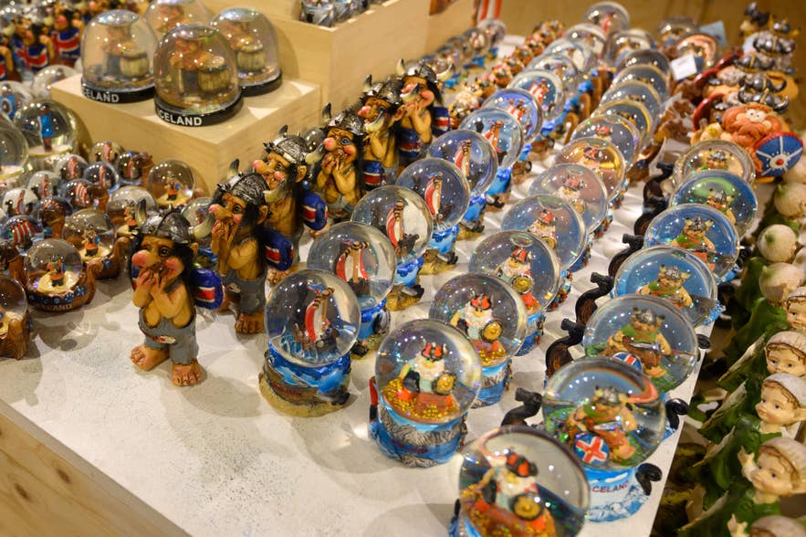 Icelandic souvenirs including Viking figurines and snow globes displayed in a gift shop Icelandic souvenirs including Viking figurines and snow globes displayed in a gift shop