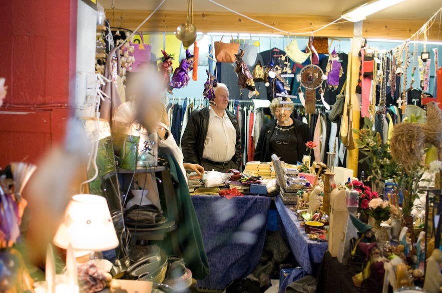 Iceland flea market with visitors exploring secondhand goods, crafts, and souvenirs Iceland flea market with visitors exploring secondhand goods, crafts, and souvenirs