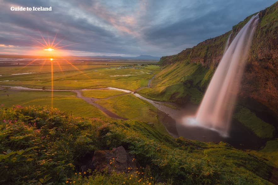 Seljalandsfoss Waterfall on the South Coast of Iceland during summer Seljalandsfoss Waterfall on the South Coast of Iceland during summer