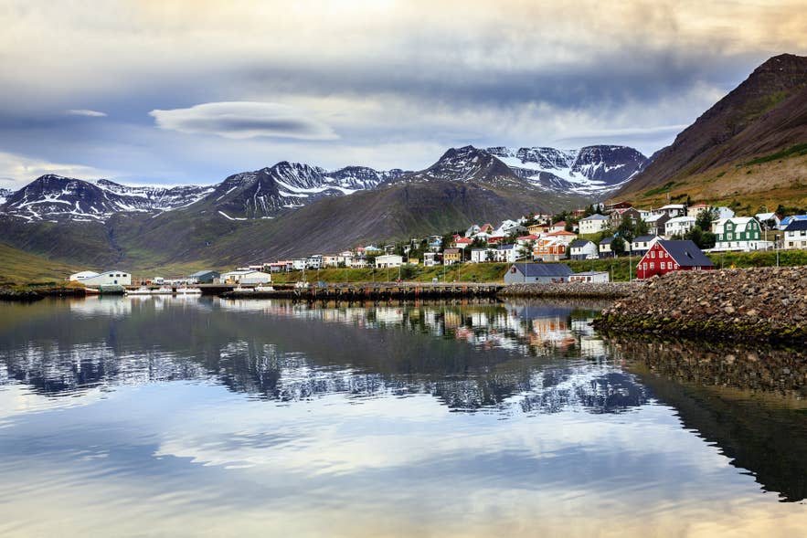 Peaceful view of Siglufjordur, the scenic North Iceland town that hosts the Folk Song Festival, a highlight of festivals in Iceland. Peaceful view of Siglufjordur, the scenic North Iceland town that hosts the Folk Song Festival, a highlight of festivals in Iceland.