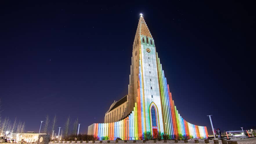 Reykjavik’s Hallgrimskirkja shines in rainbow hues for the Winter Lights Festival, a highlight among winter festivals in Iceland. Reykjavik’s Hallgrimskirkja shines in rainbow hues for the Winter Lights Festival, a highlight among winter festivals in Iceland.