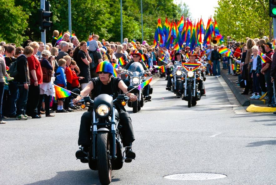Motorcycles lead a rainbow-filled parade during Reykjavik Pride, one of the top festivals in Iceland celebrating diversity. Motorcycles lead a rainbow-filled parade during Reykjavik Pride, one of the top festivals in Iceland celebrating diversity.