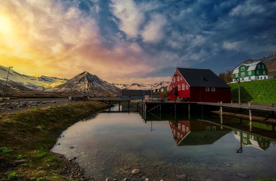 Scenic Siglufjordur at sunset, home to Sildaraevintyrid, one of the most unique summer festivals in Iceland. Scenic Siglufjordur at sunset, home to Sildaraevintyrid, one of the most unique summer festivals in Iceland.