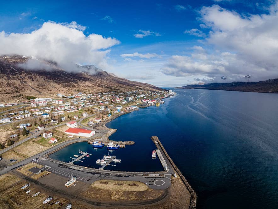Aerial view of Faskrudsfjordur, home to French Days, a cultural celebration among the most charming festivals in Iceland. Aerial view of Faskrudsfjordur, home to French Days, a cultural celebration among the most charming festivals in Iceland.