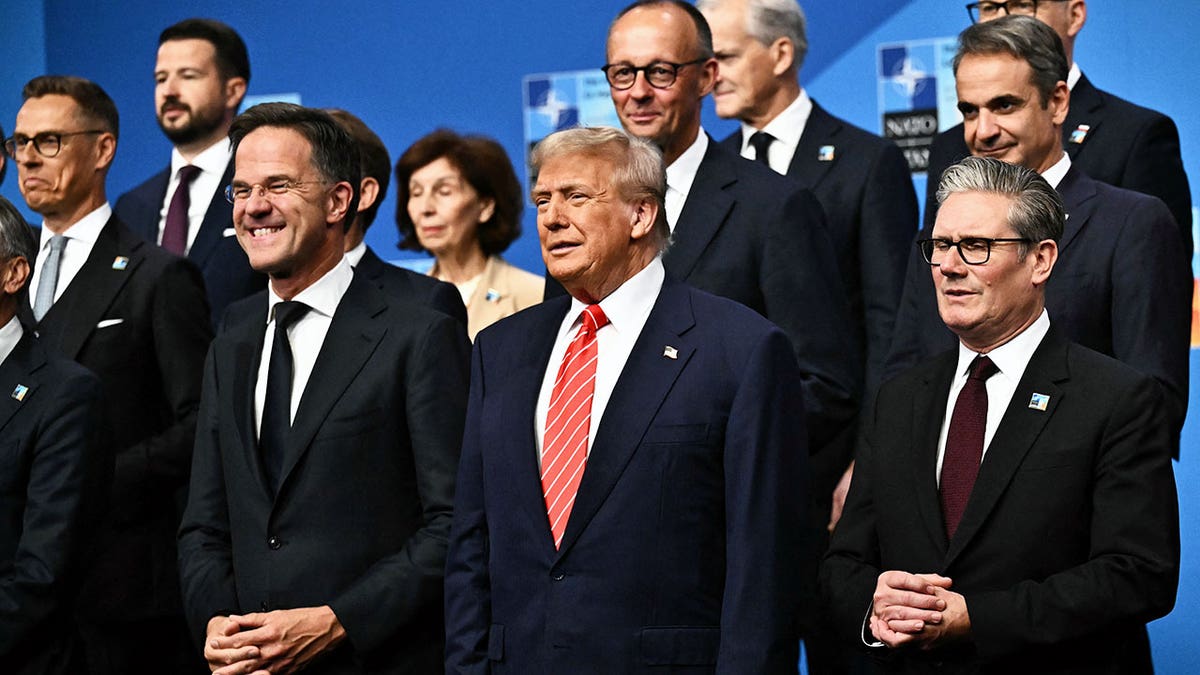 NATO Secretary General Mark Rutte, U.S. President Donald Trump and Britain's Prime Minister Keir Starmer posing with NATO leaders