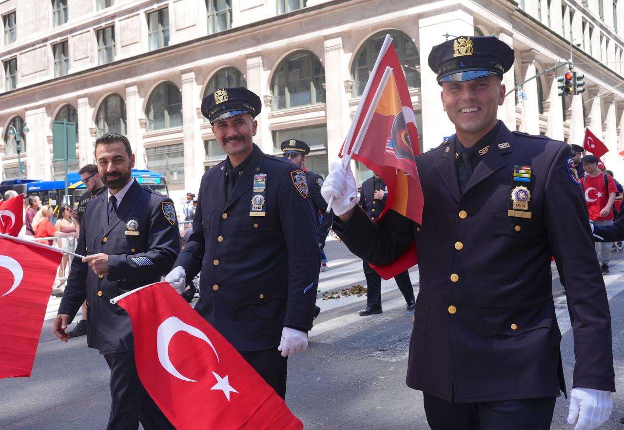 Participants march down the street carrying flags during the 43rd annual Turkish Day Parade and Festival in New York, United States, May 16, 2026. (AA Photo)