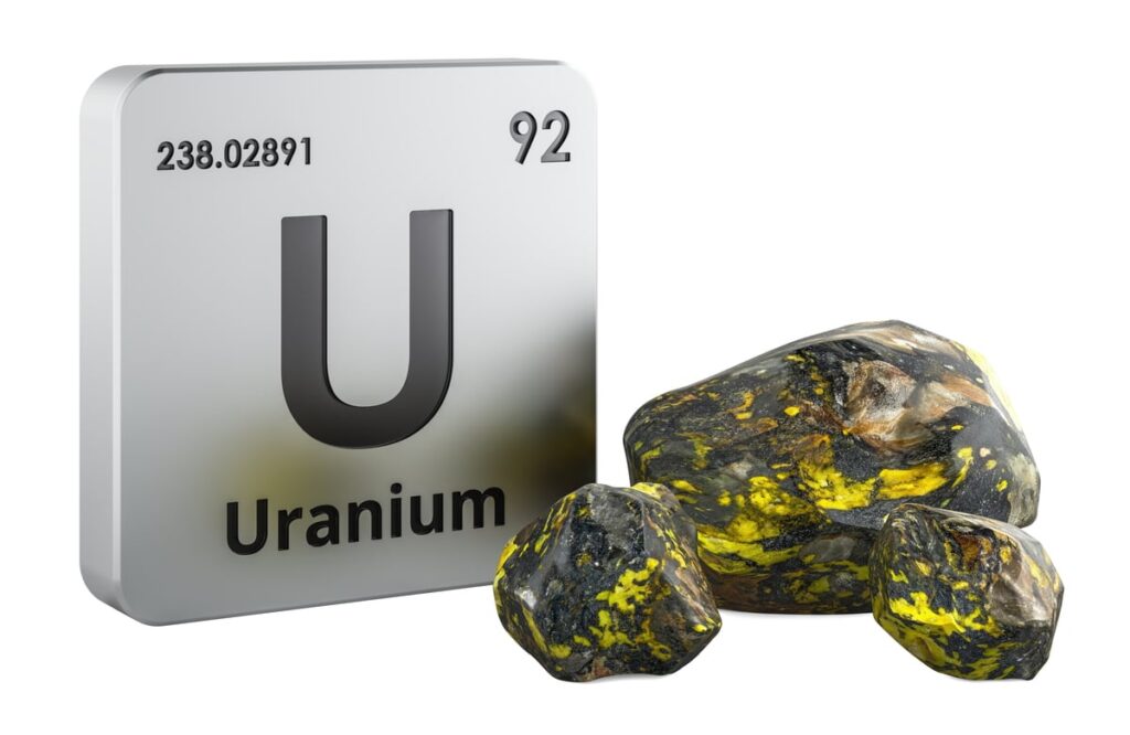 Rendered image shows the chemical symbol for uranium alongside a rock to represent uranium ore.