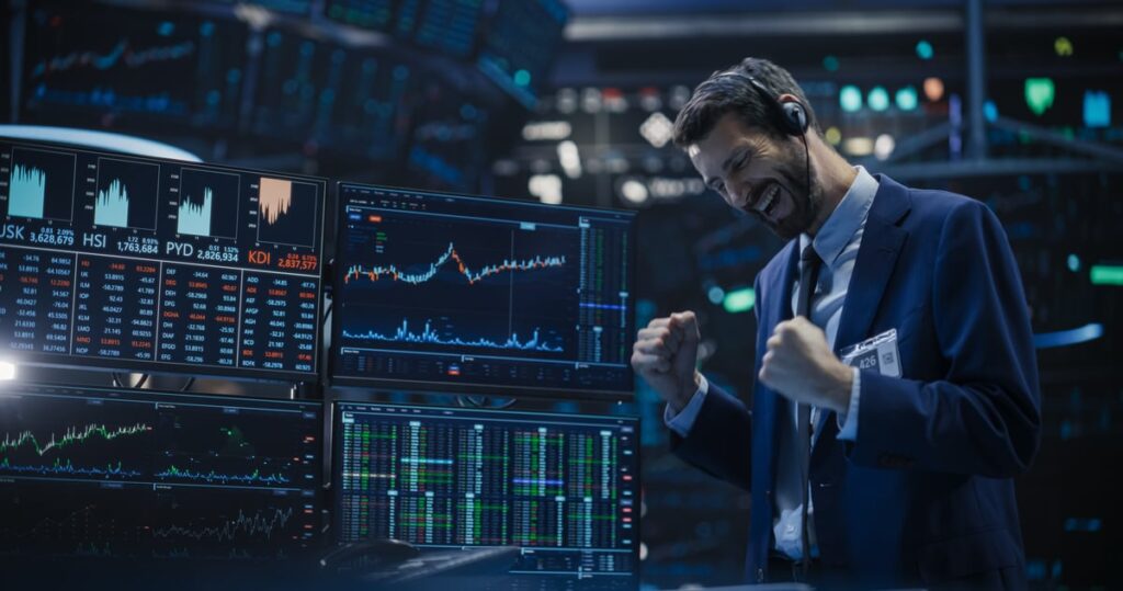 Here’s Why This Artificial Intelligence (AI) Stock Just Exploded Past Wall Street’s Most Bullish Price Target A smiling investor celebrating a win on the floor of a stock exchange.
