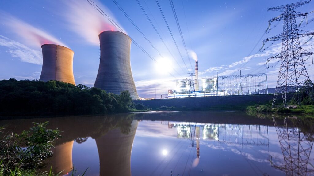 Nuclear power plant next to high voltage electricity lines.