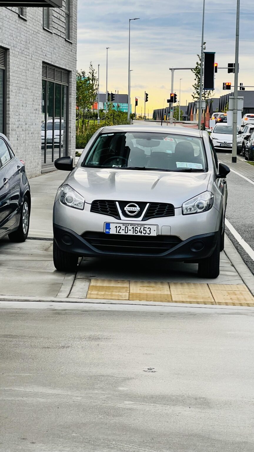 What is wrong with the person who owns this car? and the one behind has lost their mind too. There's literally no way a wheelchair person could pass through.