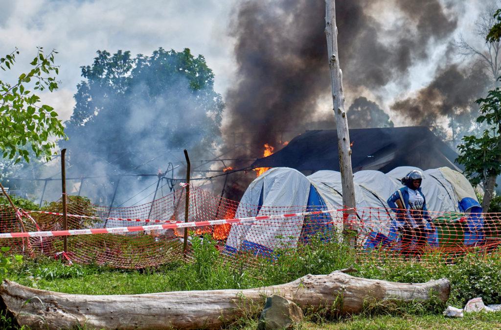 Eighteen suspected Ebola patients escape after treatment tent is set on fire for a second time in Congo
