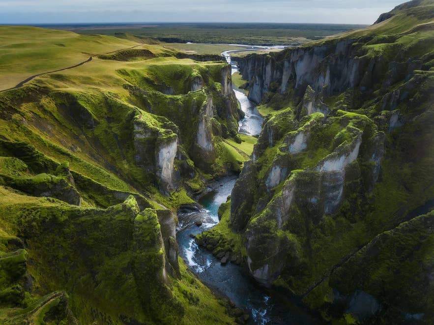 Fjadrargljufur Canyon in South Iceland, where changing weather and exposed trails influence what to wear in Iceland. Fjadrargljufur Canyon in South Iceland, where changing weather and exposed trails influence what to wear in Iceland.