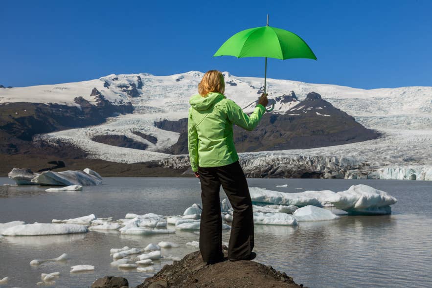 Umbrellas may look useful, but wind near Vatnajokull shows why rain jackets are smarter for what to wear in Iceland. Umbrellas may look useful, but wind near Vatnajokull shows why rain jackets are smarter for what to wear in Iceland.