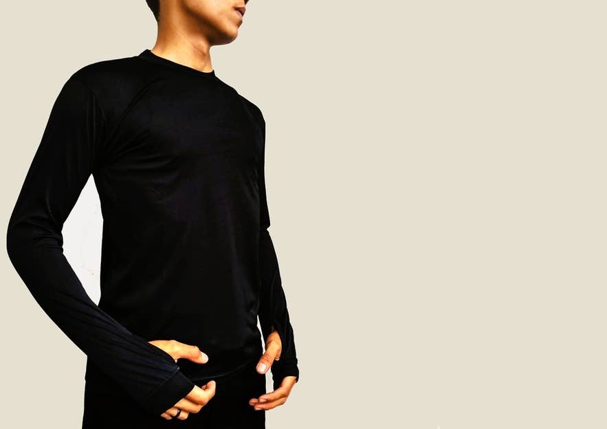 Base layer shirt for cold weather, showing what to wear in Iceland for warmth and layering during outdoor travel. Base layer shirt for cold weather, showing what to wear in Iceland for warmth and layering during outdoor travel.