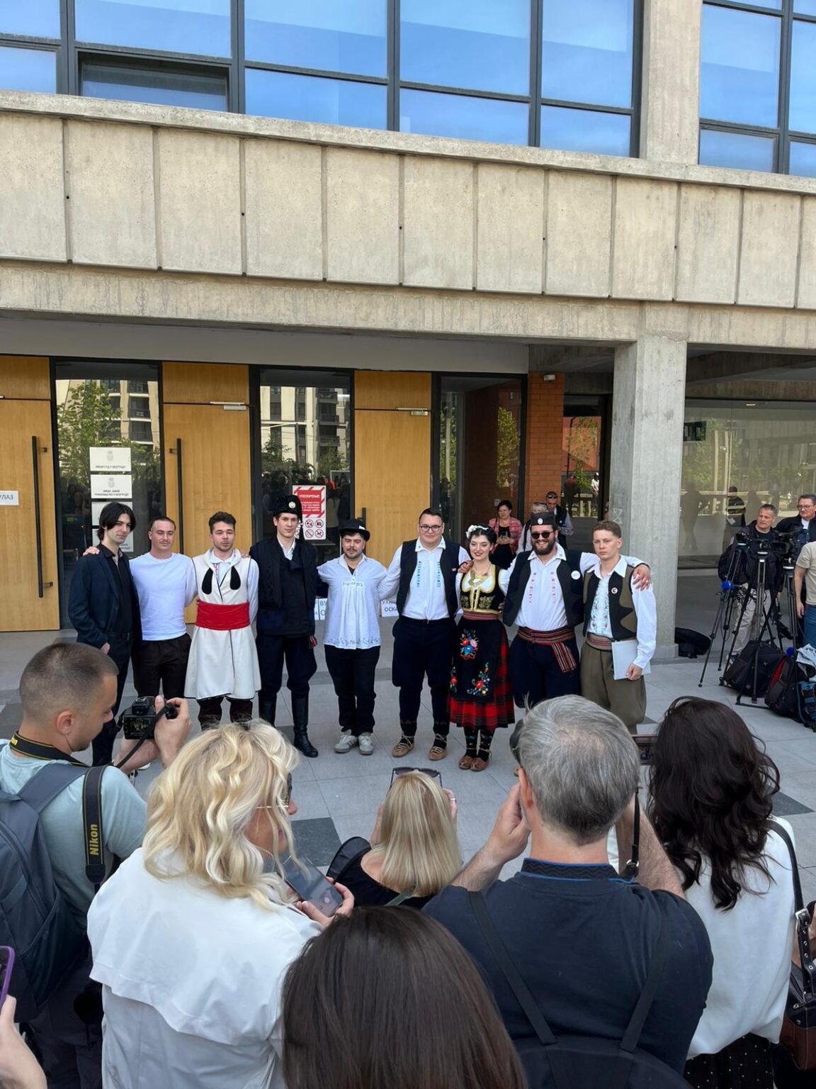 Students accused of subverting the constitutional order came to the Palace of Justice in national costumes