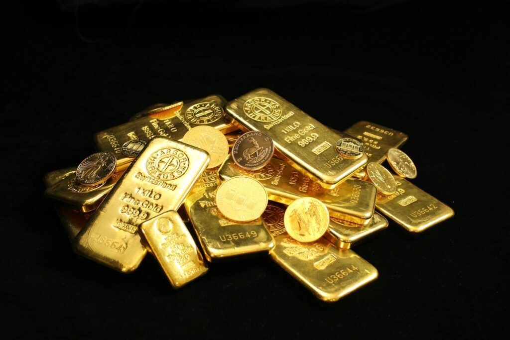 Gold bars and coins for investment and wealth.