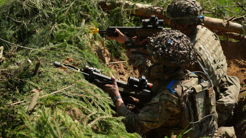 Rehearsal of war: British soldiers on Nato's border with Russia warn they're 'not playing'