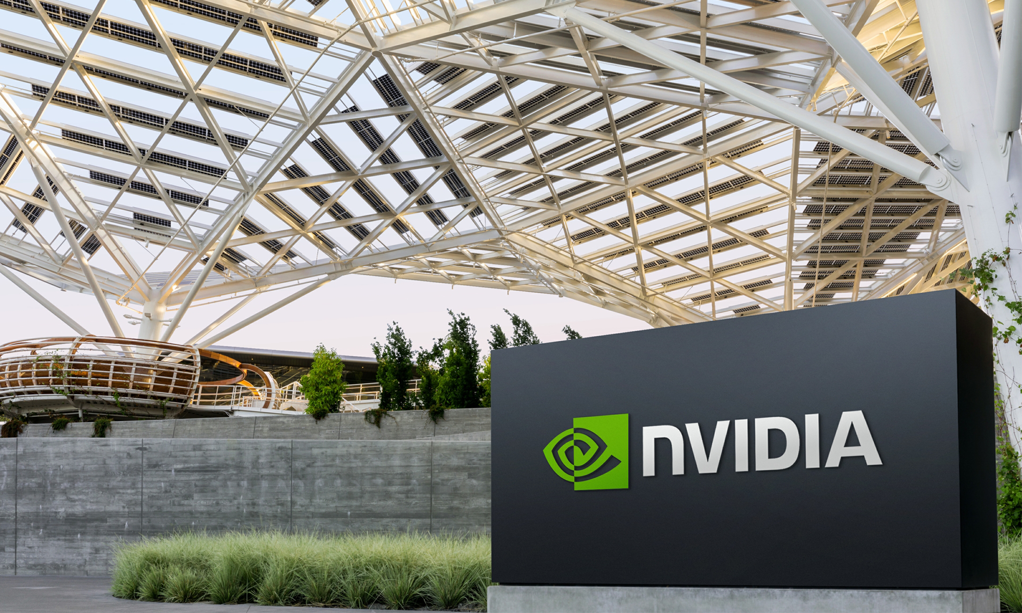 Structure with a sign displaying the Nvidia logo out front.