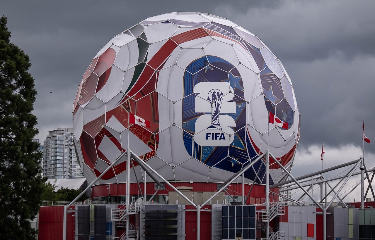 Adidas and FIFA logos figure prominently of the "Beautiful Dome" installation over top of Science World.
