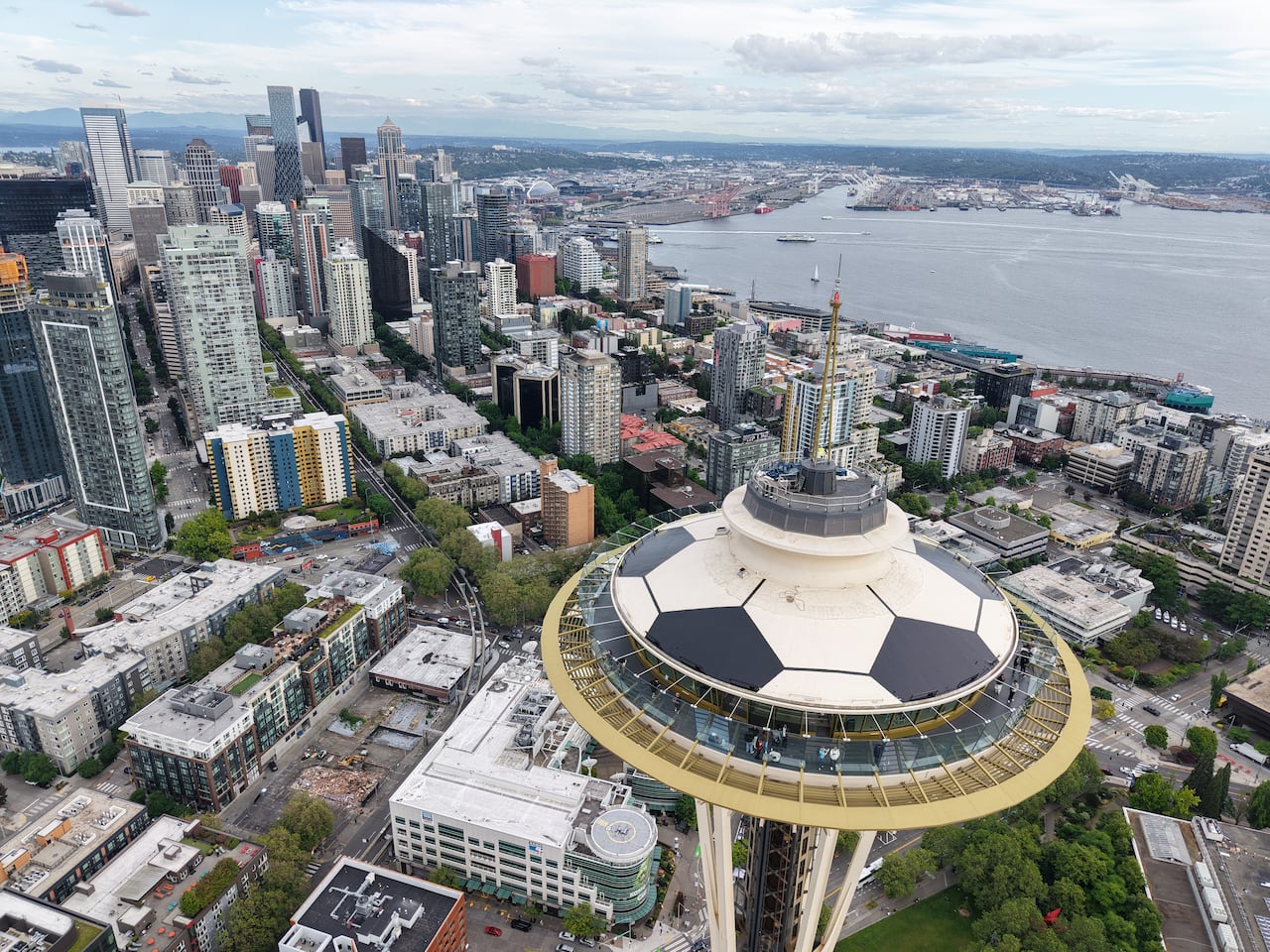 The Seattle Space Needle has turned its roof into a giant and generic soccer ball to mark the arrival of the World Cup.