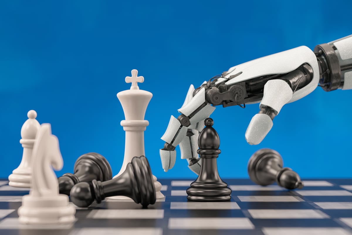 A robotic hand plays chess.