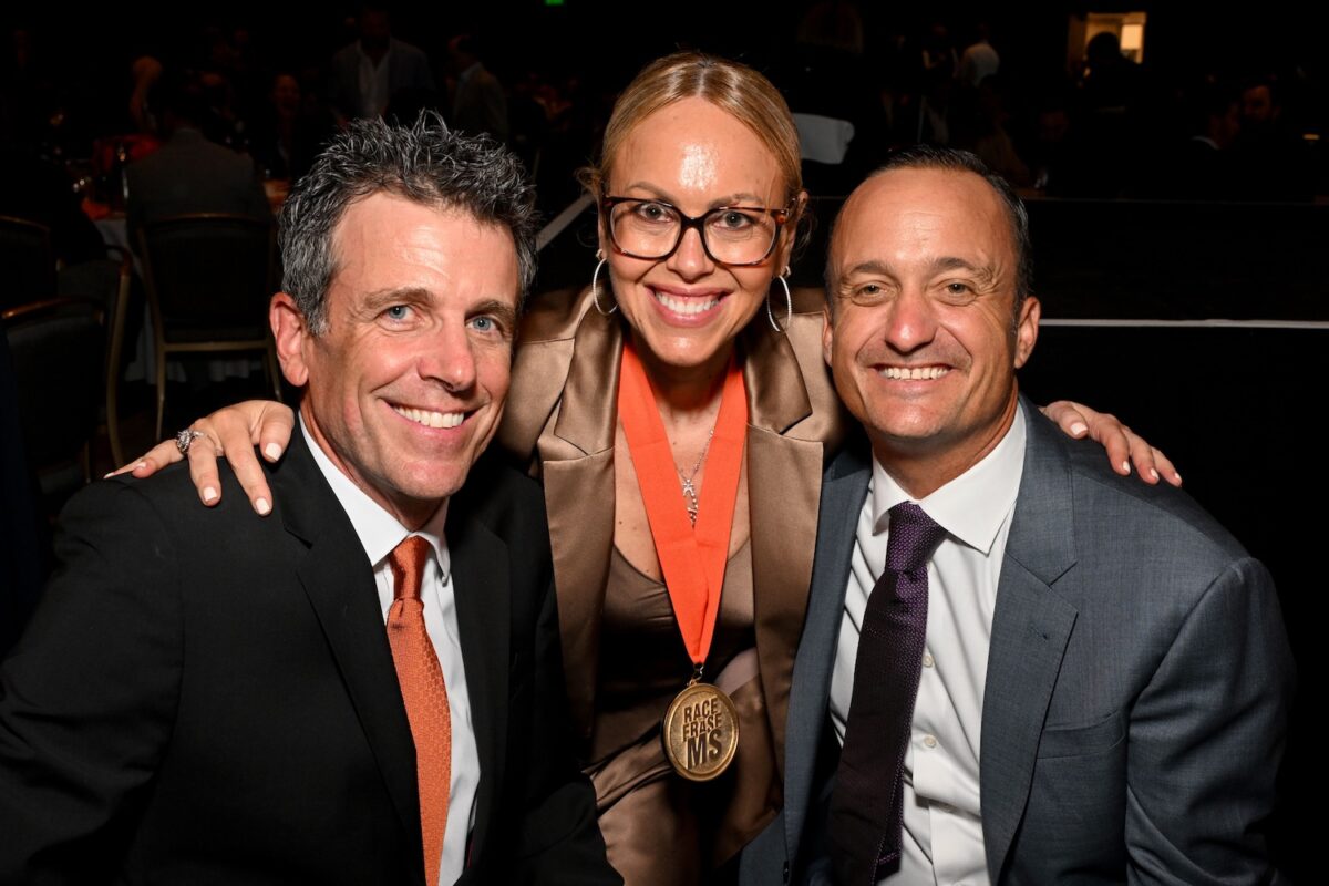 Adam Paul and Naomi Bulochnikov-Paul, EVP, Communications, Disney Entertainment Television and guest 