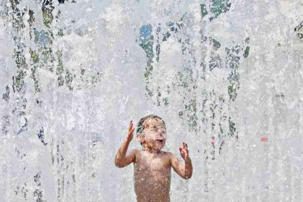 Most Areas to See Rain Showers Tuesday amid Hot Weather